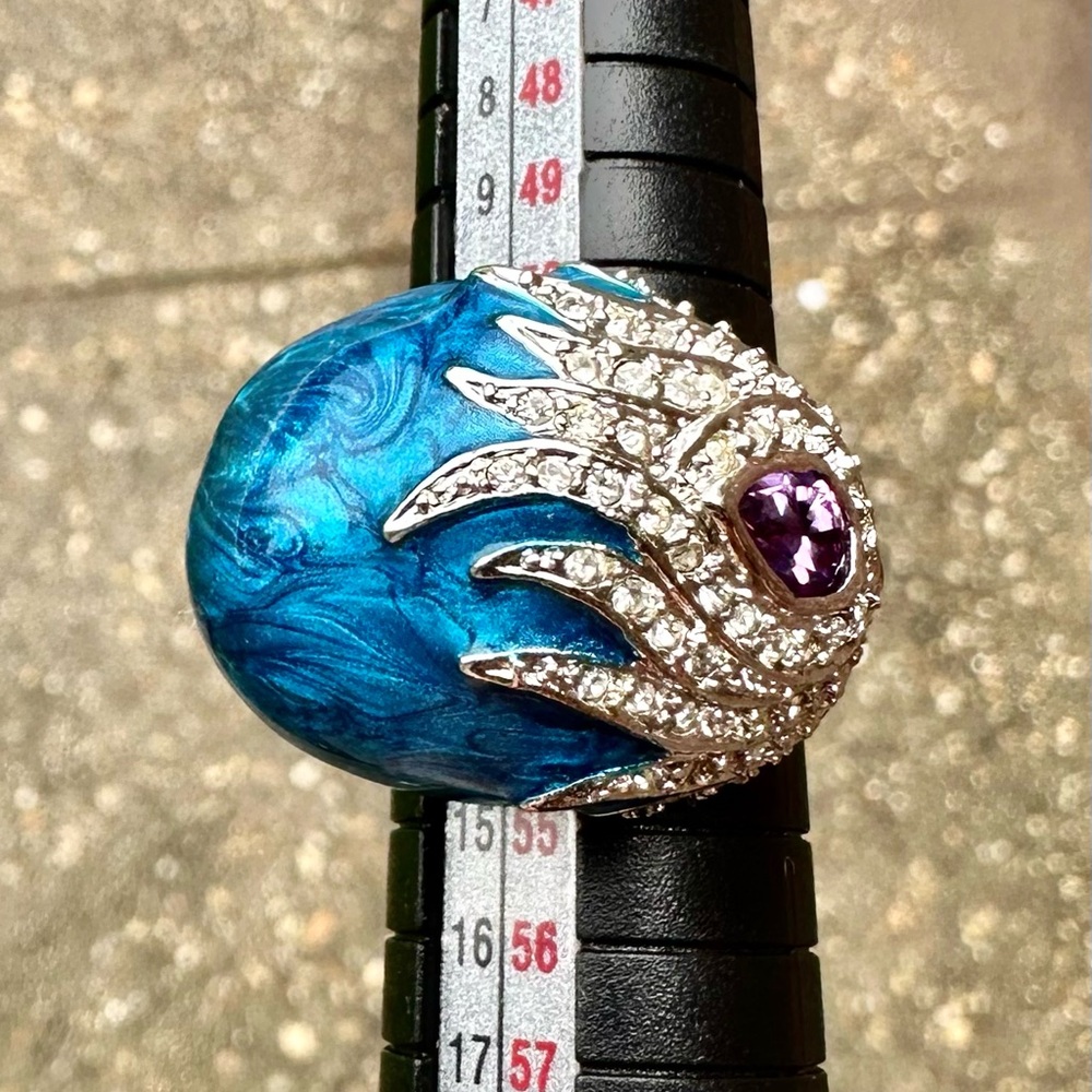 Iman cocktail ring size 6.5 FREE with a $400 purchase comes in Kendra duster.